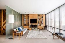 Small house of nearly 60 years not old-fashioned by glass and wood